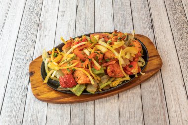 Shashlik is a popular roast beef skewer in Russia, the Caucasus, and Central Asia. The name varies by country: it is called mtsvadi in Georgia, khorovats in Armenia, and khebab in Azerbaijan.