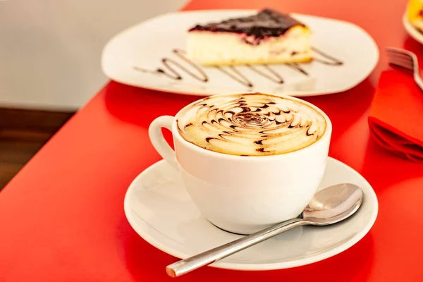 Cup Coffee Made Barista Red Table Spoon Portion Cheesecake Background — Photo