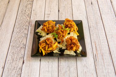 Hindistan 'da sayısız muhtemel soğan bhaji tarifi var..