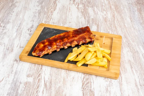 Plate Pork Ribs Barbecue Sauce Portion Homemade Fries Light Wooden — Stock Photo, Image