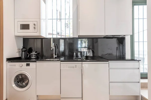Front Image Open Kitchen Black Marble Countertop Small Appliances Four — ストック写真