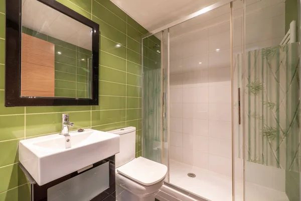 Bathroom Green Tiles Wall Mirror Wooden Frame White Porcelain Sink — Zdjęcie stockowe