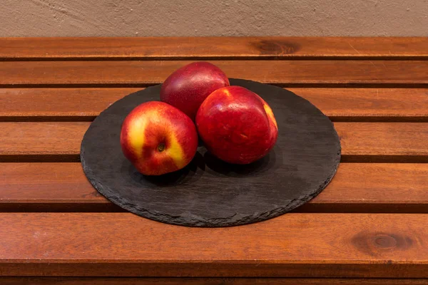 Plate Three Nectarines Ripe Ready Eat Wooden Table — Photo