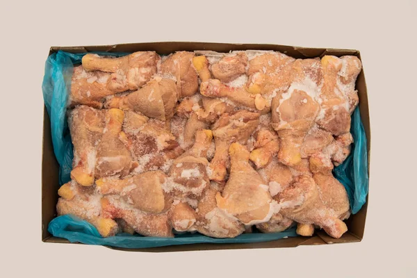 Box of bulk frozen chicken thighs with a few kilos of meat