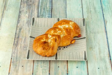 Guava ekmeği Venezuela 'nın And bölgesinden tipik bir tatlı ekmek olarak kabul edilir. Guava posası ve şekerle dolu bir ekmekten oluşur. Farklı şekillerde gelebilir: börek, sarılmış ekmek.