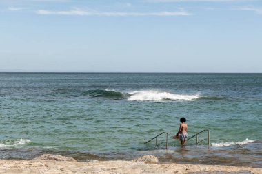 Rocky and bathing area on the beaches of Estoril in Portugal