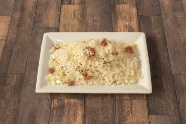 Fried rice is a dish of Chinese cuisine. Its origin is a homemade dish from China