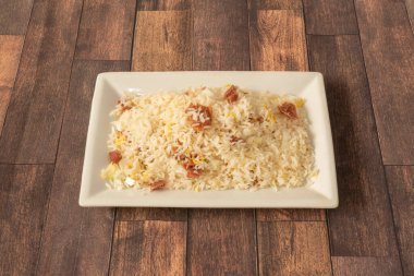 Fried rice is a dish of Chinese cuisine. Its origin is a homemade dish from China