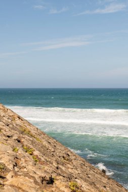 views of the sea from a cliff on a summer day