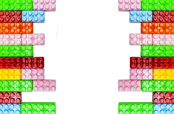 Toy colorful plastic blocks isolated on white background — Stock Photo, Image