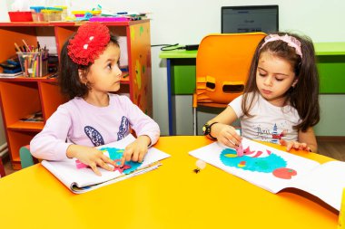 BAKU,AZERBAIJAN-25 MAY 2019 : Children are engaged in the classroom, kindergarten learning, drawing