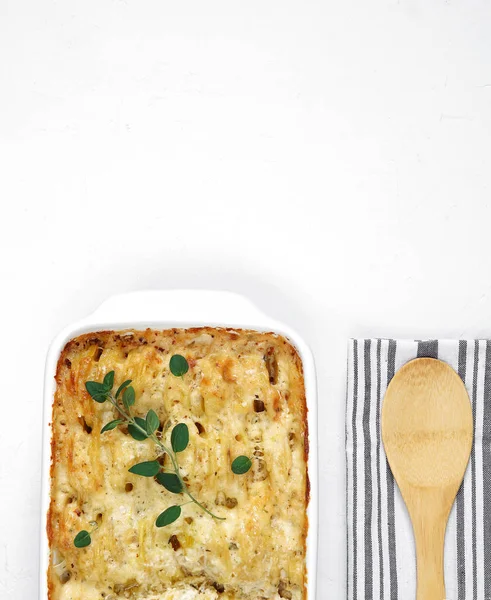 Casserole. French cuisine. Homemade potato gratin in a ceramic frying pan for baking. Top view copy space