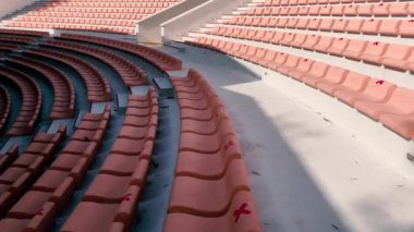 Outdoor theater. Rows of seats on a sunny day with seat tags for coronavirus precautions