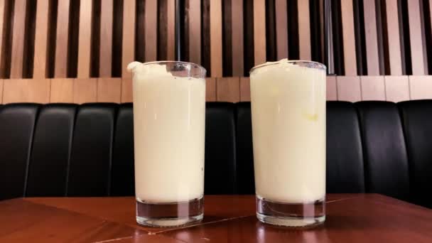 Two Pino Colada Cocktails Table Bar Drinking Straws — Stock Video