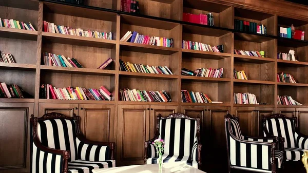 Retro Library Lots Books Long Book Wall Reading Chairs —  Fotos de Stock
