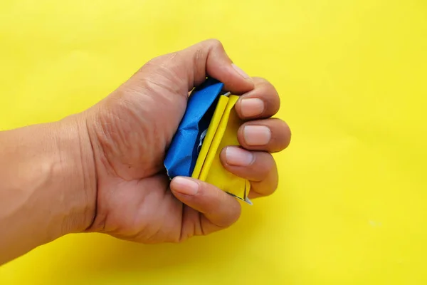Concept Ending War Ukraine Paper Colours Ukrainian Flag Man Hand — Stock Photo, Image