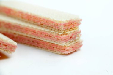 Wafers with raspberry yoghurt isolated on a white background