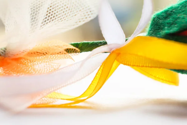 Soft yellow and white silk ribbon. Background image. Soft focus