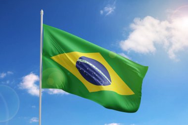 Flag of Brazil on blue sky. 3d illustration.