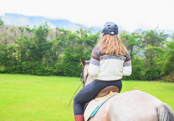 Back View Caucasian Woman Wearing Andean Sweater Riding Horse Meadow — Stock Photo, Image
