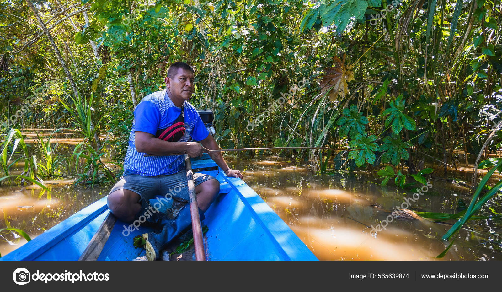 Native American Man Fishing Wooden Fishing Pole Swamp Motorboat Horizontal  Stock Photo by ©AleixBR 565639874