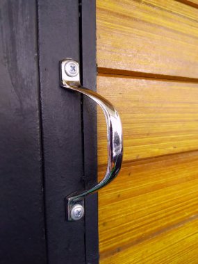 Depo odasının kapı kolunu kapat. Paslanmaz çelik kol..