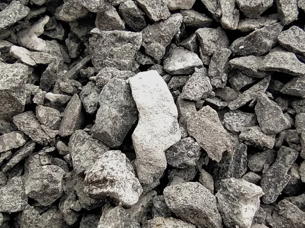 Macro shot of crushed stone. Crushed stone for pouring floors in construction sites.