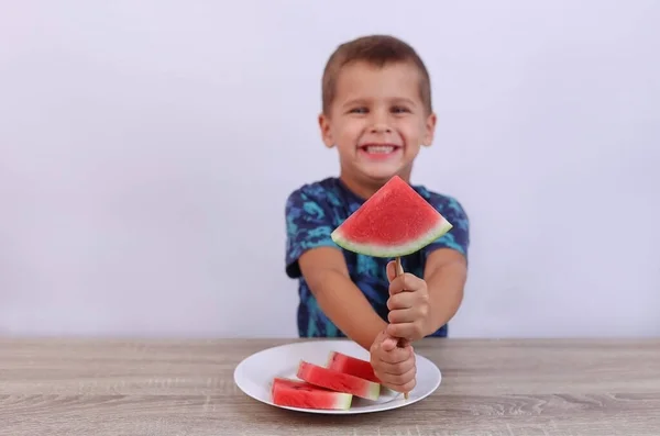 Out Focus Boy Holding Watermelon High Quality Photo — Zdjęcie stockowe