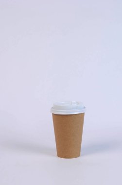 brown cardboard glass for liquid on a white background. High quality photo