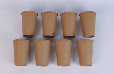 glasses made of natural materials are laid out on a white table. High quality photo