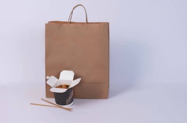 delivery of rice in a box, cardboard package on a white background. High quality photo