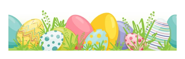 Kusursuz sınır. Renkli Paskalya yumurtaları ve yeşil çimenlerin üzerinde kusursuz desenler..