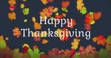 Animated pattern of rotating dry autumn leaves with congratulations on blackboard background, happy thanksgiving day background concept. High quality 4k footage