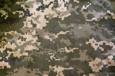 Askeri kamuflaj kumaşı, arka plan dokusu. Dijital kamuflaj deseni. Orman kamuflaj dokusu. Kamuflaj şablonu. Orman dokusu renkleri.