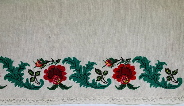 National ornament on Ukrainian embroidery. Ornamentation of old Ukrainian towels and tablecloths, embroidery and placement of patterns. Home-woven fabric. Handmade. Embroidery of the late 19th century.