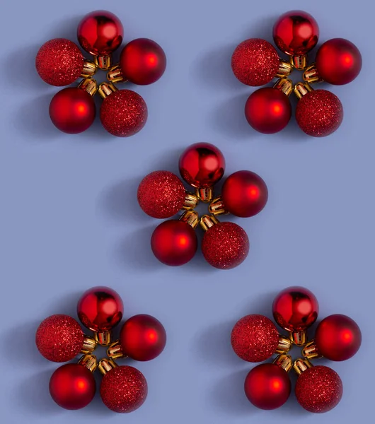 Pattern of red Christmas decorations. Minimal New Year flat lay concept.