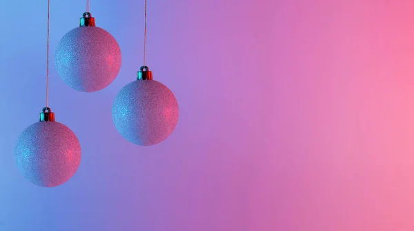 White Christmas baubles in vibrant bold gradient holographic colors. Minimal New Year surrealism. Concept art.