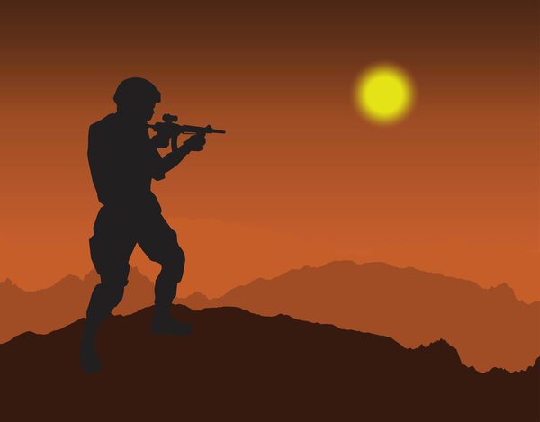 silhouettes of man standing on mountain holding gun
