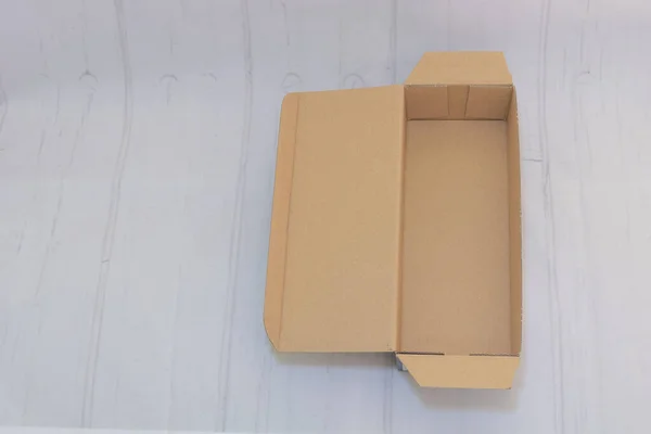 Closeup shot of a packing box on the white background — Fotografia de Stock