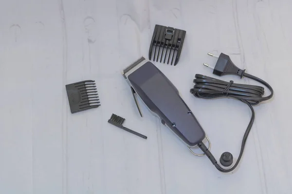 Closeup shot of a black hair clipper on the white background — Stockfoto