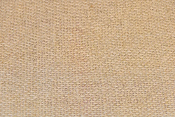 Primer plano de un fondo de textura de tela de arpillera —  Fotos de Stock