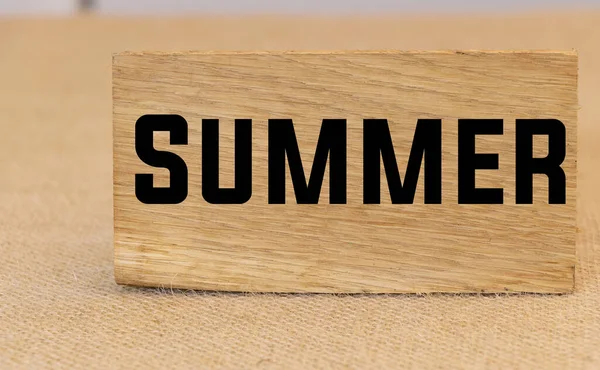 Summer text written on a piece of wood concept — Foto de Stock