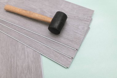 Laminate. Repair of floors. Rubber mallet for parquet and laminate flooring, vinyl boards.