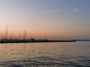 Ukraine, Odessa, July 4, 2019.Ships and container ships in the port.Logistics, transportation, unloading of container ships, freight transport, container cargo ships, sea transport.