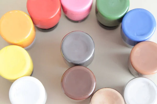 Tubes Paint Multicolored Airbrush Bottles Art Supplies Color Stretching Warm — Fotografia de Stock