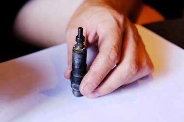 Bearing used in bicycle hubs. A set of balls placed inside the bushing in a special bored groove (groove) and pressed against it with special cones. Bicycle bearing repair, close-up