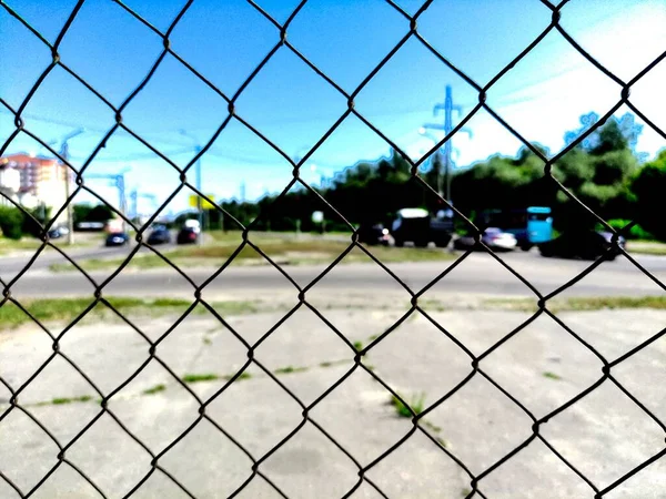 fence with a net and a chain