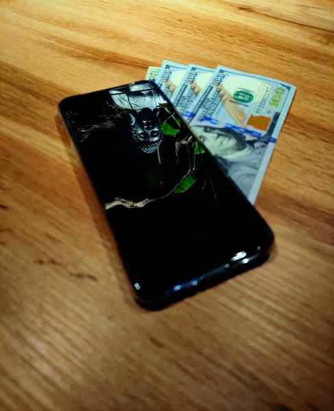 smartphone with money and dollar