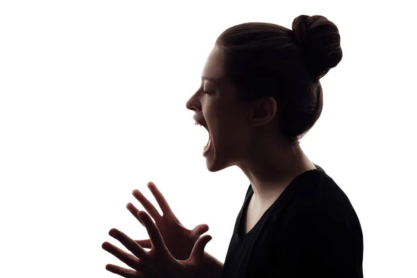 Sylwetka kobiety krzyczącej z gniewu. Odizolowany portret na białym tle — Zdjęcie stockowe