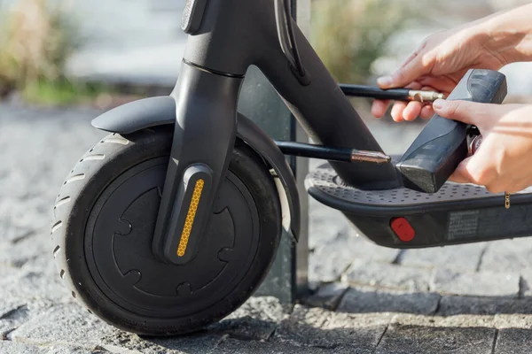 Electric scooter as alternative to a car to moving round the city